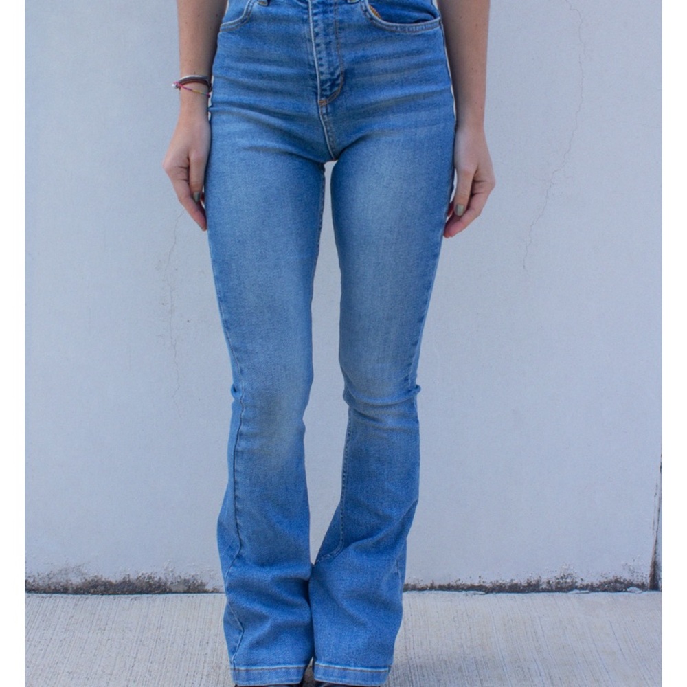 Light wash subdued flared jeans.